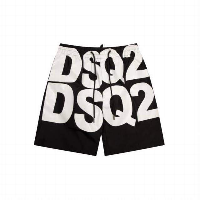 Dsq，2024夏装新款 官网同步 款式简约不简单，超有型 加网款沙滩裤 采用进口100%纤维超重工手工印花工艺，特别突出logo装饰设计 很是时尚 不得不称赞